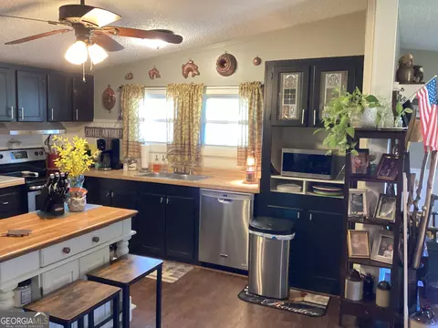 Kitchen - 935 Cannafax Rd, Barnesville, GA 30204 photo 2 of 2