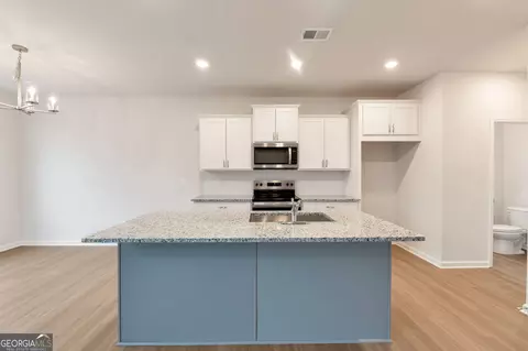 Kitchen - 106 Windmill Ct, Calhoun, GA 30701 photo 2 of 3