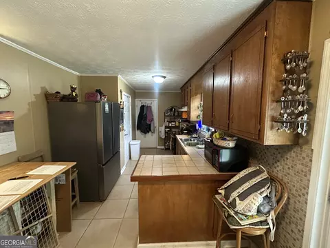 Kitchen - 183 Garrison Rd, Cornelia, GA 30531 photo 3 of 3