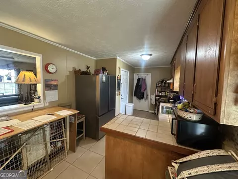 Kitchen - 183 Garrison Rd, Cornelia, GA 30531 photo 2 of 3
