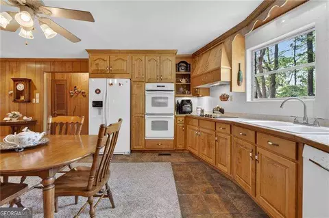 Kitchen - 149 Pine Bluff Trl, Jackson, GA 30233 photo 2 of 3