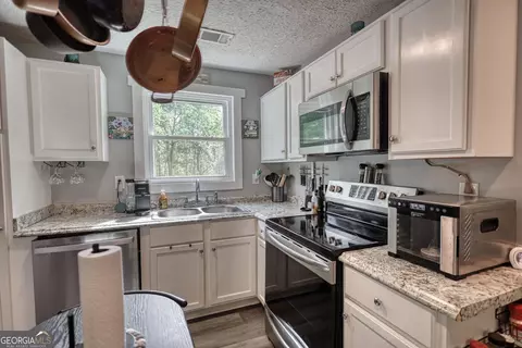 Kitchen - 119 Collier Rd, Jackson, GA 30233 photo 1 of 8