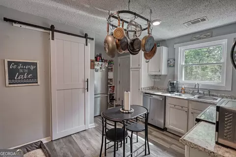 Kitchen - 119 Collier Rd, Jackson, GA 30233 photo 7 of 8