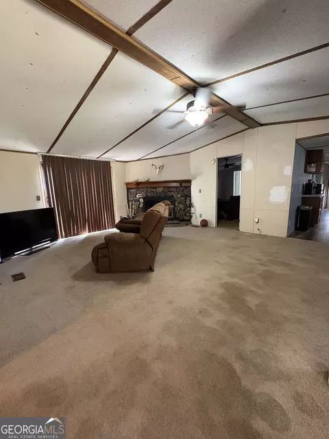 Living - 1050 Darrell Thompson Rd, Lyons, GA 30436 photo 1 of 1