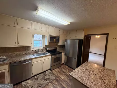 4445 Lake Forest Dr, Oakwood, GA 30566
