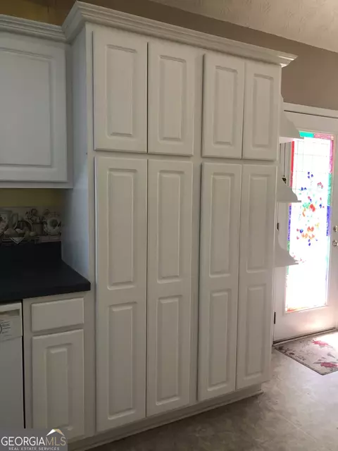 Kitchen - 1744 Campbell Rd, Covington, GA 30014 photo 3 of 4