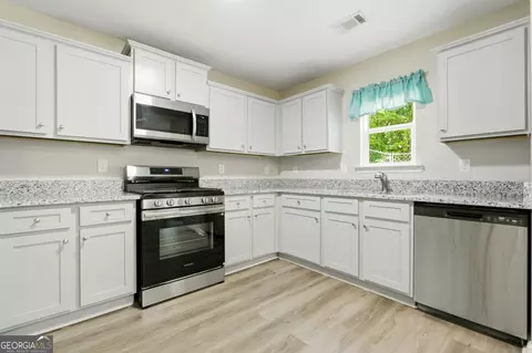 Kitchen - 175 Pine Ridge Rd, Covington, GA 30016 photo 2 of 2