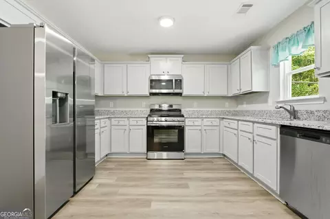 Kitchen - 175 Pine Ridge Rd, Covington, GA 30016 photo 1 of 2