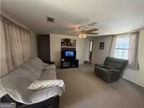 Living - 560 Rabitsch Rd, Millen, GA 30442 photo 1 of 2
