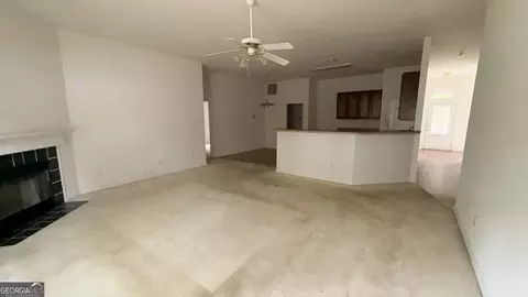 Living - 65 Lakeridge Ct, Covington, GA 30016 photo 2 of 2
