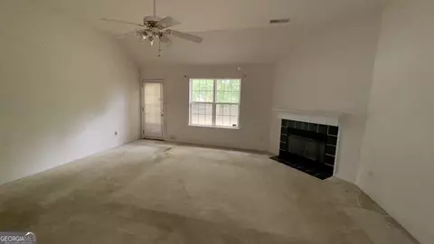 Living - 65 Lakeridge Ct, Covington, GA 30016 photo 1 of 2