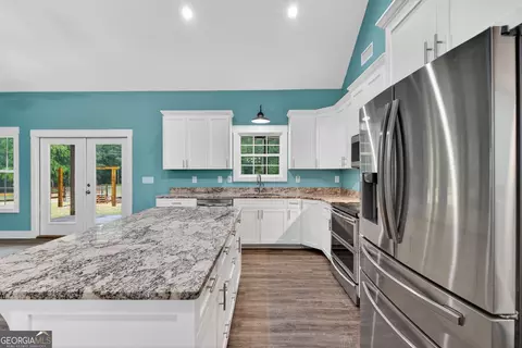 Kitchen - 227 Mckenzie Rd, Milner, GA 30257 photo 1 of 3