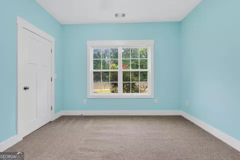 Bedroom - 227 Mckenzie Rd, Milner, GA 30257 photo 4 of 4