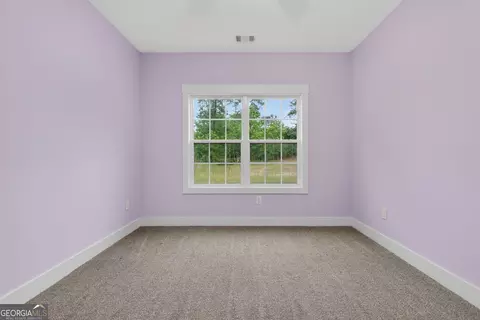 Bedroom - 227 Mckenzie Rd, Milner, GA 30257 photo 3 of 4
