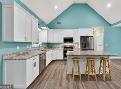 Kitchen - 227 Mckenzie Rd, Milner, GA 30257 photo 2 of 3