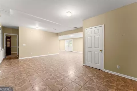 Living - 4795 Winding Rose Dr, Suwanee, GA 30024 photo 8 of 8