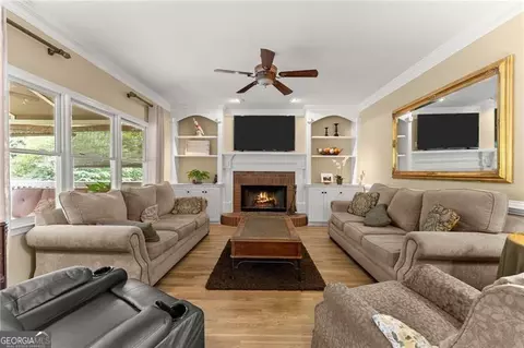 Living - 4795 Winding Rose Dr, Suwanee, GA 30024 photo 4 of 8
