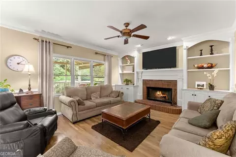 Living - 4795 Winding Rose Dr, Suwanee, GA 30024 photo 5 of 8