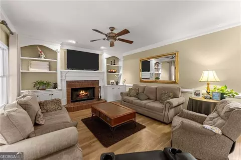 Living - 4795 Winding Rose Dr, Suwanee, GA 30024 photo 7 of 8