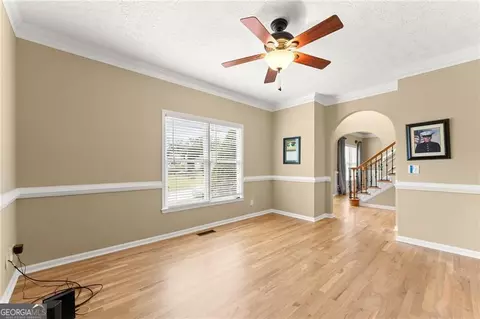 Living - 4795 Winding Rose Dr, Suwanee, GA 30024 photo 2 of 8