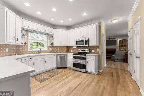 Kitchen - 4795 Winding Rose Dr, Suwanee, GA 30024 photo 3 of 4