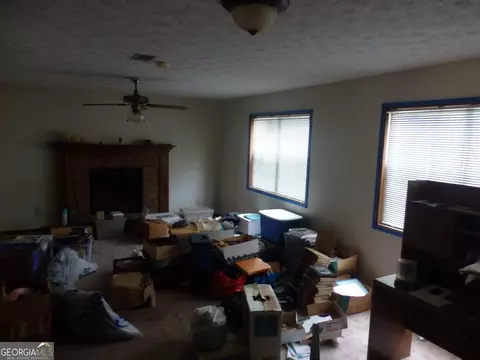 Living - 1307 Heritage Ct, Hampton, GA 30228 photo 5 of 6