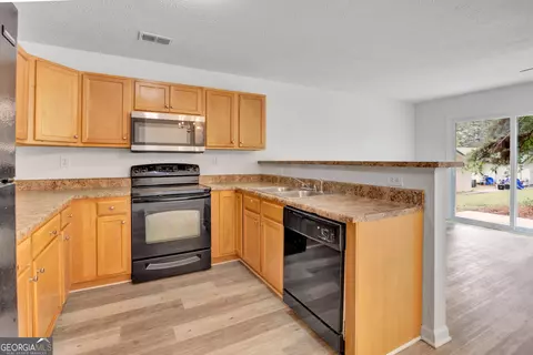 Kitchen - 127 Heritage Way, Jackson, GA 30233 photo 2 of 2