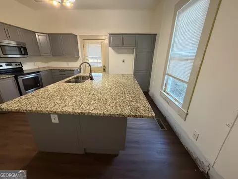 Kitchen - 6 N Broad St, Porterdale, GA 30014 photo 4 of 4