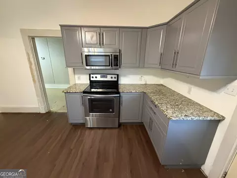Kitchen - 6 N Broad St, Porterdale, GA 30014 photo 3 of 4