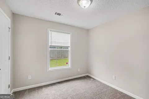 Bedroom - 1382 N Hampton Dr, Hampton, GA 30228 photo 6 of 6