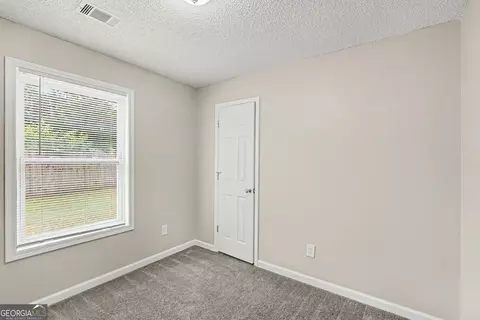 Bedroom - 1382 N Hampton Dr, Hampton, GA 30228 photo 5 of 6