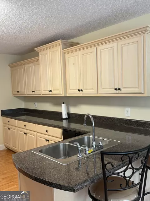 Kitchen - 105 Nealys Way, Haddock, GA 31033 photo 3 of 3