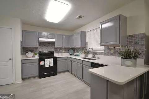 Kitchen - 6397 E Meyer Dr, Morrow, GA 30260 photo 2 of 6