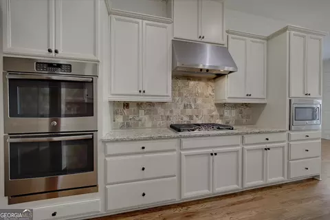 Kitchen - 121 Matthews Rd, Canton, GA 30115 photo 2 of 3