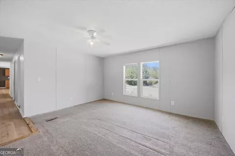 Living - 261 Blount Chapel Rd, Haddock, GA 31033 photo 6 of 6