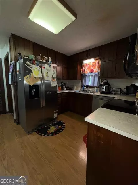 Kitchen - 217 Babbs Mill Rd, Hampton, GA 30228 photo 2 of 2