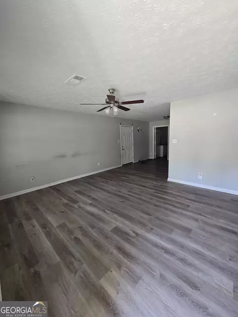 Living - 12130 Brown Bridge Rd, Covington, GA 30016 photo 1 of 2