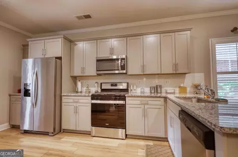 Kitchen - 9120 Leverett Cir, Covington, GA 30014 photo 3 of 3