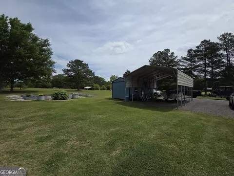 Exterior - 395 E Milner Rd, Zebulon, GA 30295 photo 22 of 30