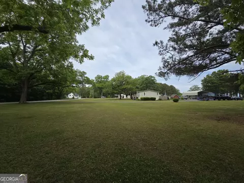 Exterior - 395 E Milner Rd, Zebulon, GA 30295 photo 13 of 30