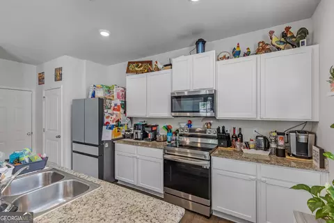 Kitchen - 575 Walnut Grove Way, Pendergrass, GA 30567 photo 2 of 2