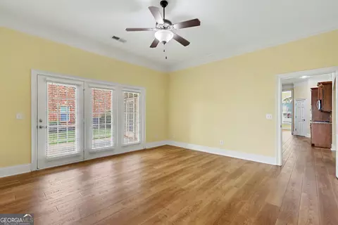 Living - 3126 Alhambra Cir, Hampton, GA 30228 photo 5 of 6
