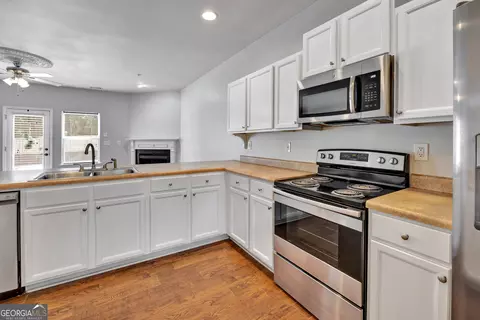 Kitchen - 180 Orchard Dr, Covington, GA 30014 photo 3 of 3