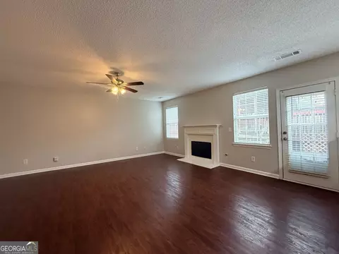 Living - 609 Vaughan Dr, Hampton, GA 30228 photo 9 of 12