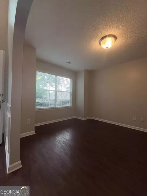 Living - 609 Vaughan Dr, Hampton, GA 30228 photo 2 of 12