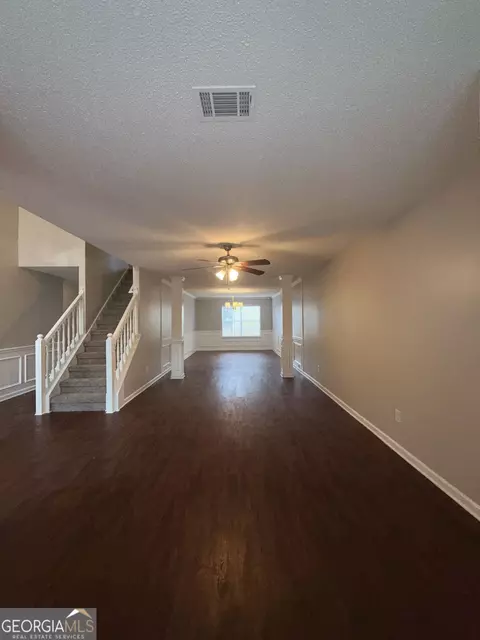 Living - 609 Vaughan Dr, Hampton, GA 30228 photo 6 of 12