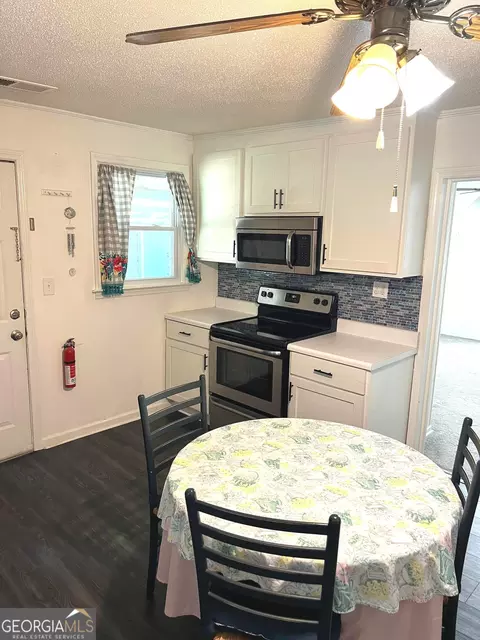 Kitchen - 12 E 4th St, Aragon, GA 30104 photo 3 of 3