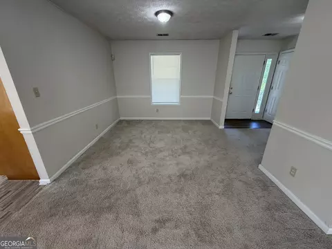 Living - 70 Boardwalk Ave, Covington, GA 30016 photo 6 of 7