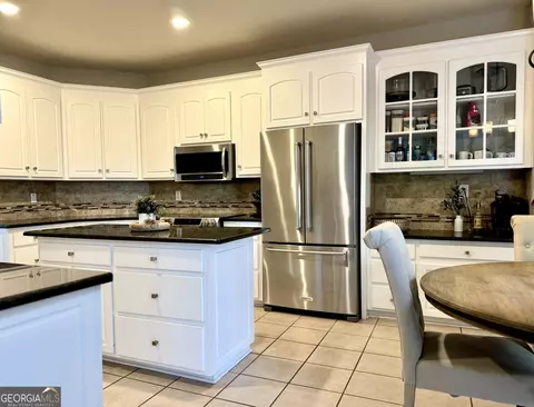 Kitchen - 114 Springbrook Dr, Cornelia, GA 30531 photo 2 of 2
