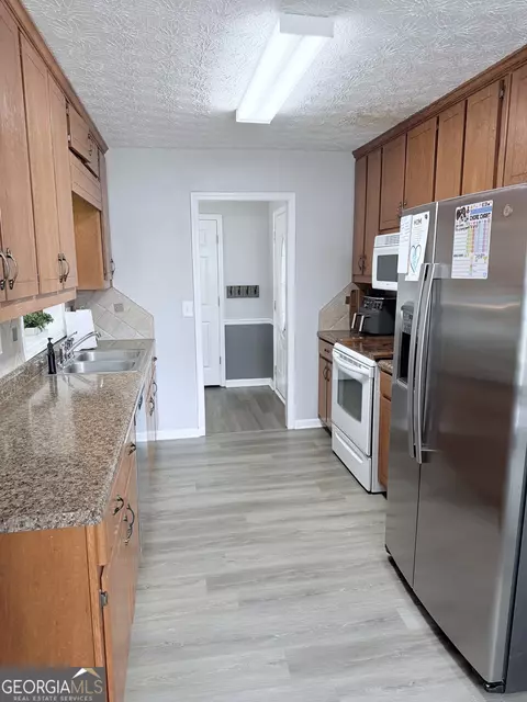 Kitchen - 1313 Crestview Rd, Winder, GA 30680 photo 2 of 2